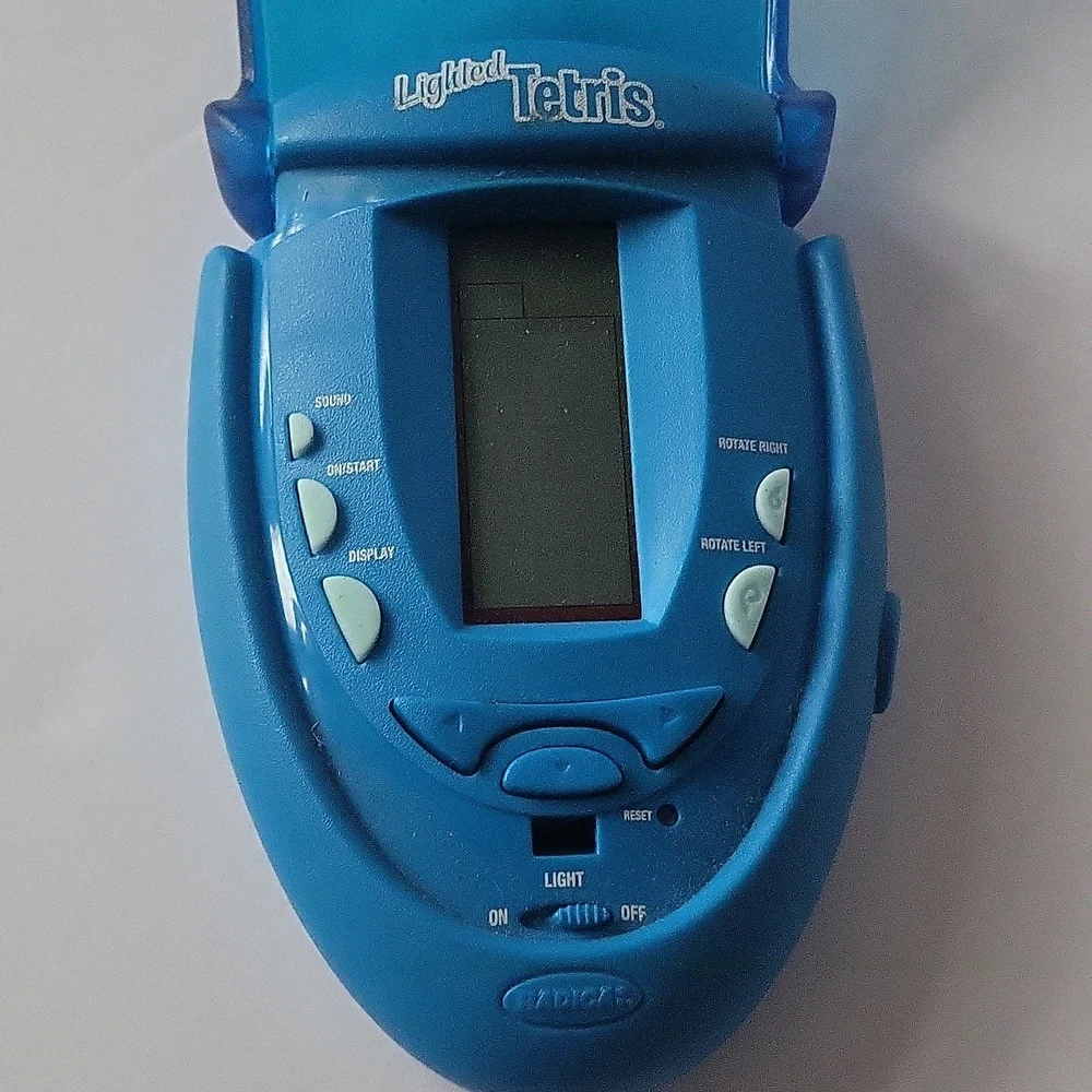 Tetris Lighted Electronic Handheld Travel Game Radica Fliptop Blue 2004 RADICA